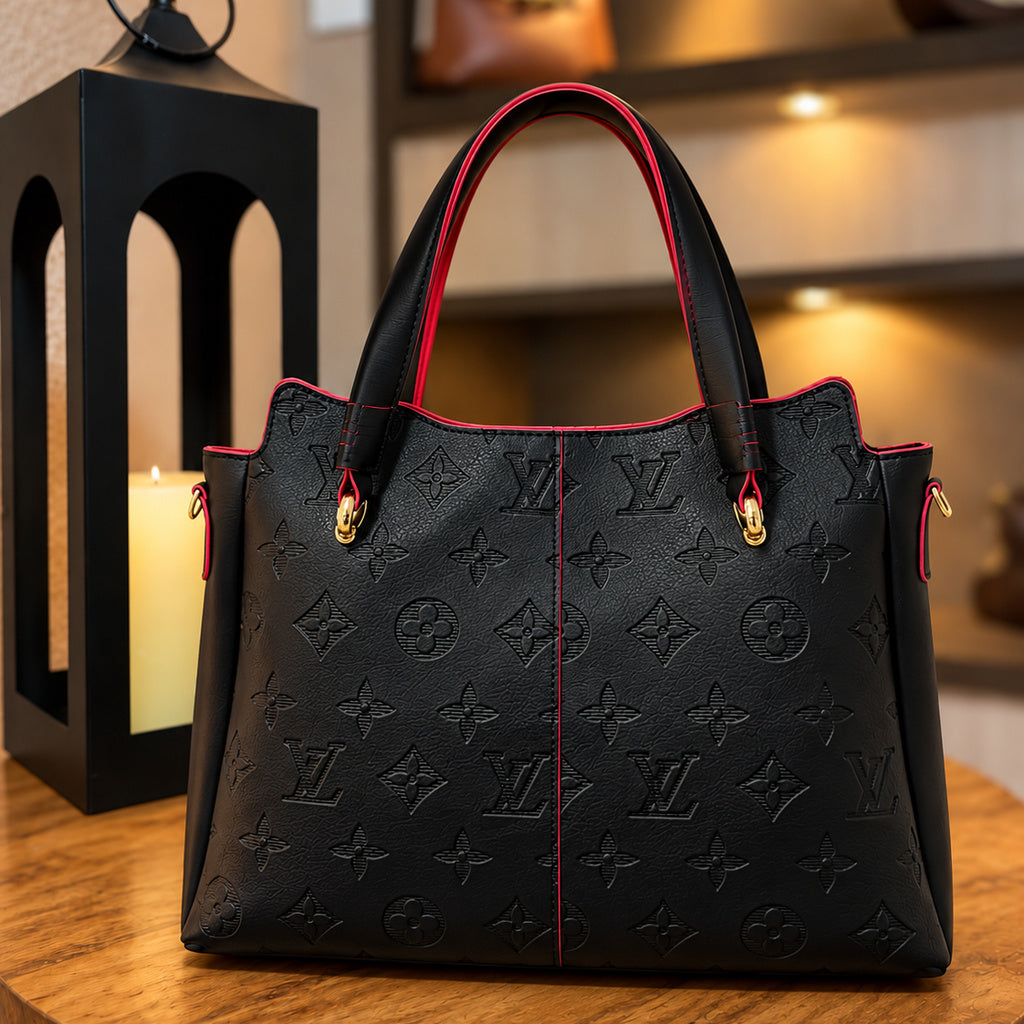Bolsa tote preta com detalhes vermelhos, vista frontal